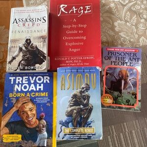5 books: Trevor Noah Born A Crime, Isaac Asimov The Complete Robot, Prisoner of
